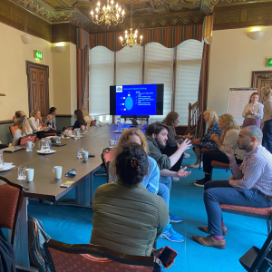 Group of young researchers discussing at ESO Edinburgh Stroke Research Workshop.